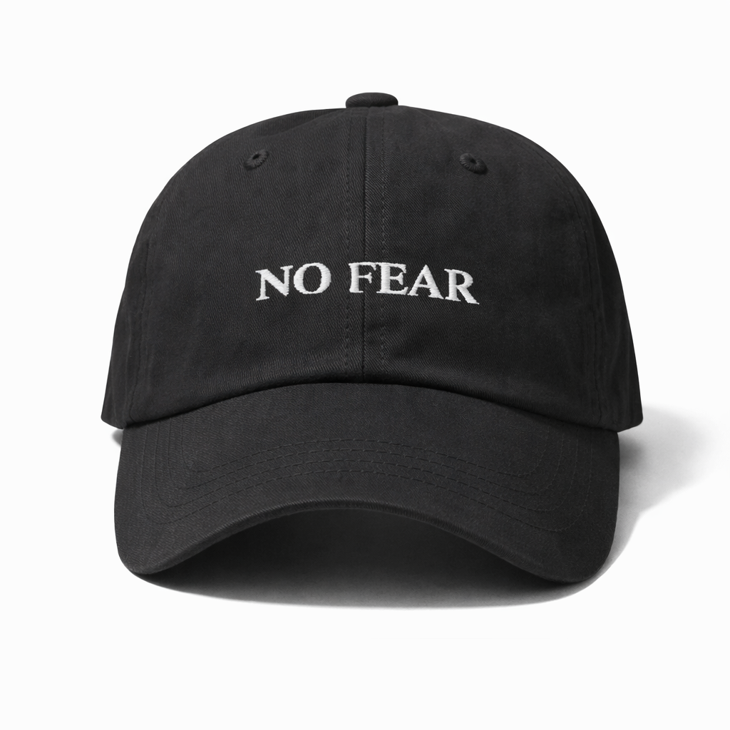Black cap with 'NO FEAR' text on a white background